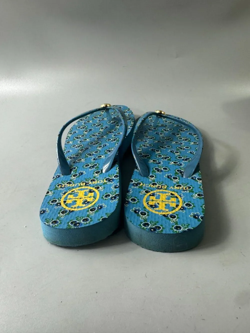 Tory Burch All Over Print Flip Flops in Blue